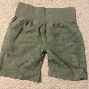 NVGTN shorts in a camo light green.